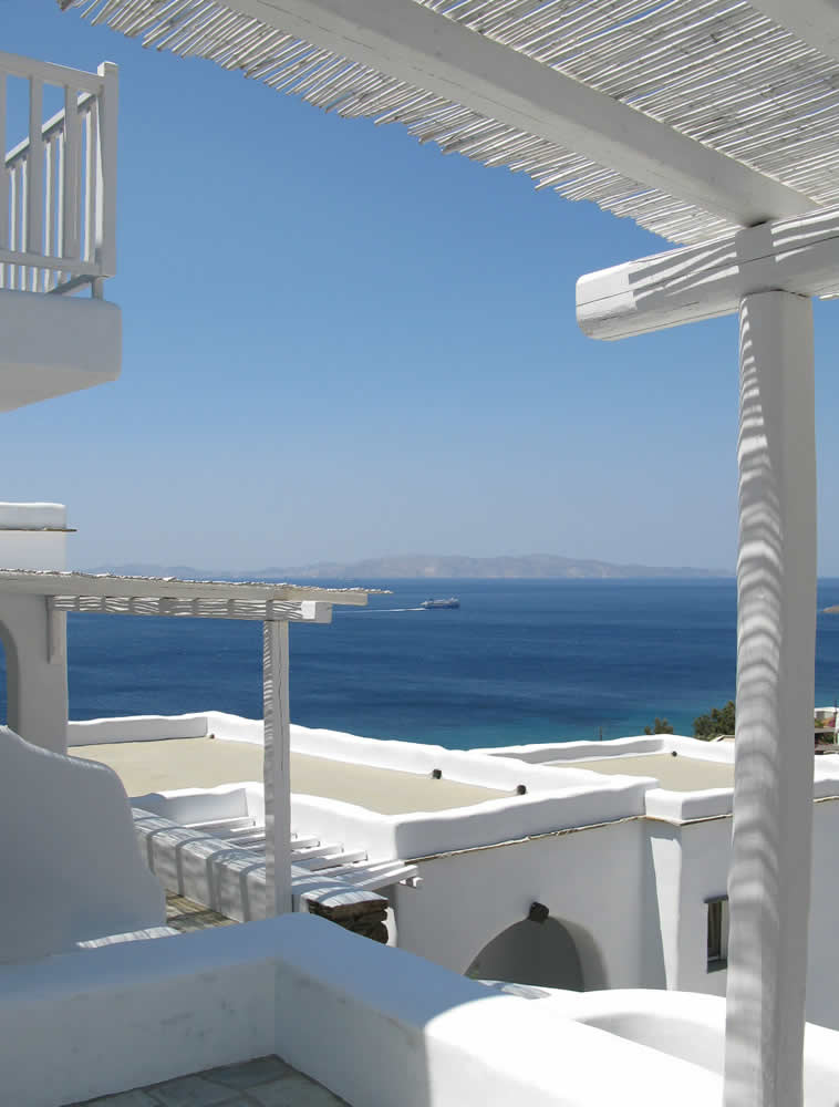 Rigel, Duplex apartment. Ground Floor: Bedroom with 2 single beds, bathroom, kitchen, lounge with settee/beds, TV, & First Floor: Bedroom with double bed, en-suite bathroom, TV and cute balcony, Vega Apartments in Tinos island, Cyclades